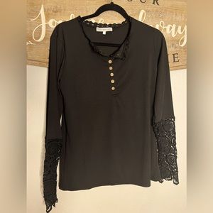 Black buttoned blouse with arm detail
